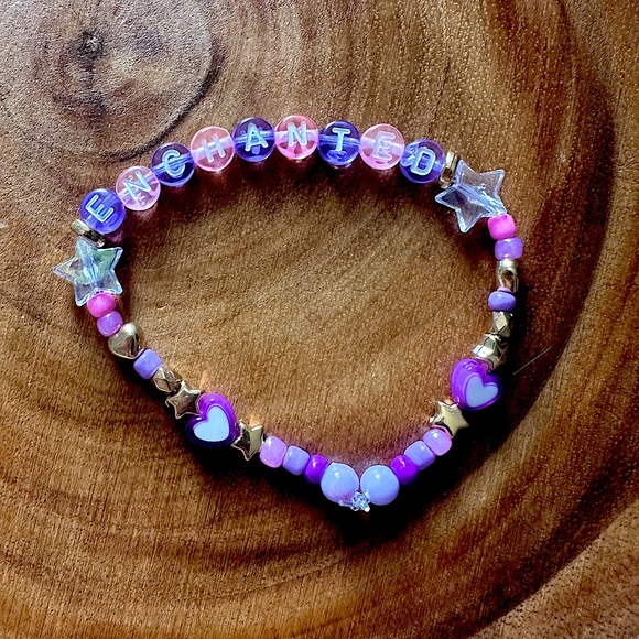 5 for $20 Taylor Swift Handmade Friendship Beaded Bracelet
“Enchanted” - Picture 1 of 1